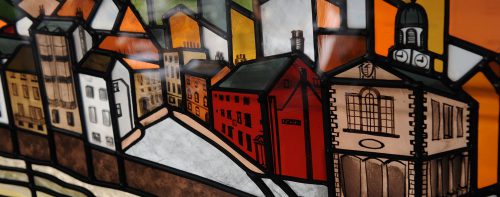 painted glass scene of Whitby including town hall