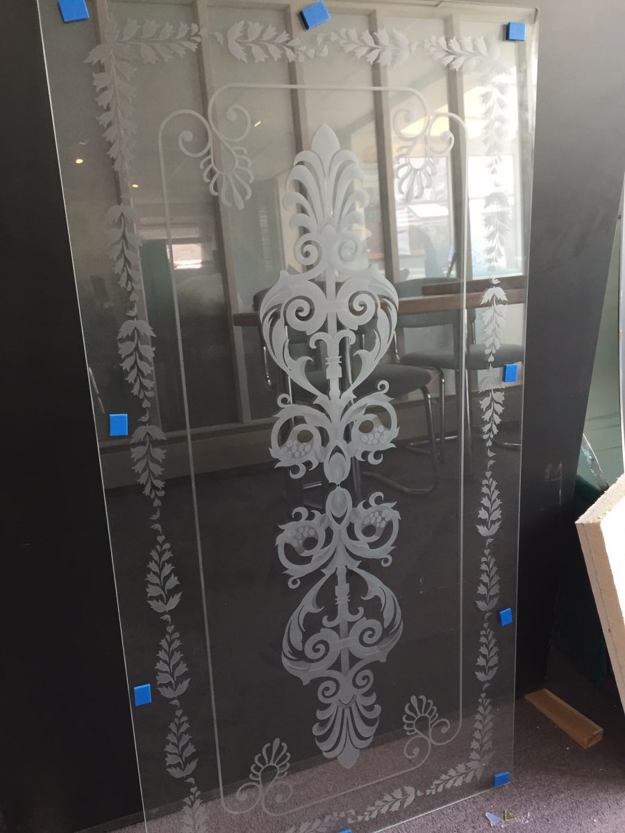 Etched glass example by daedalian ready for installation