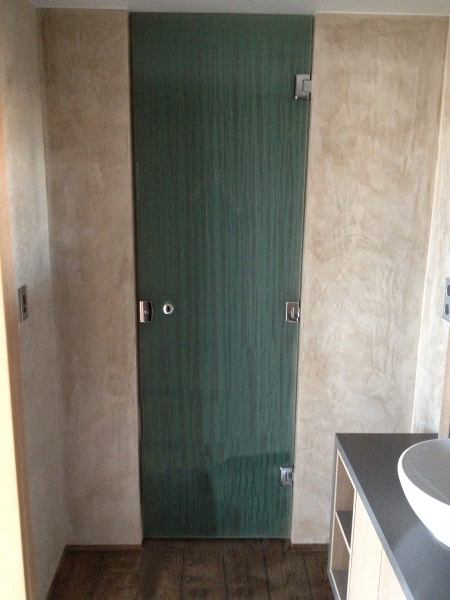 The shower doors, crafted from laminated chiffon