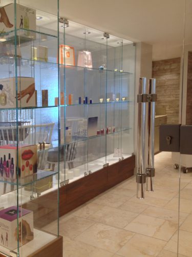 Spa products and glass shelving, the Headland Hotel, Newquay, Cornwall