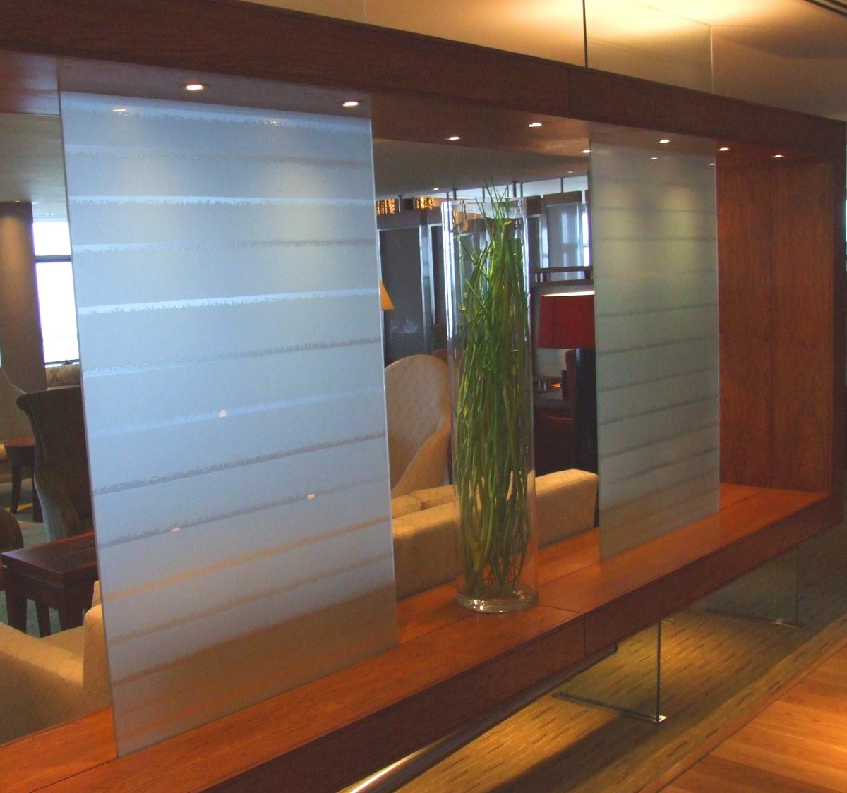 Etched glass restaurant balustrade partitions screens created for the Aghadoe Heights Hotel & Spa.
