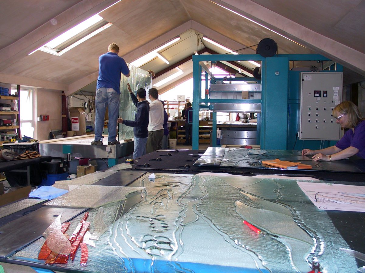 working on the glass in the studio