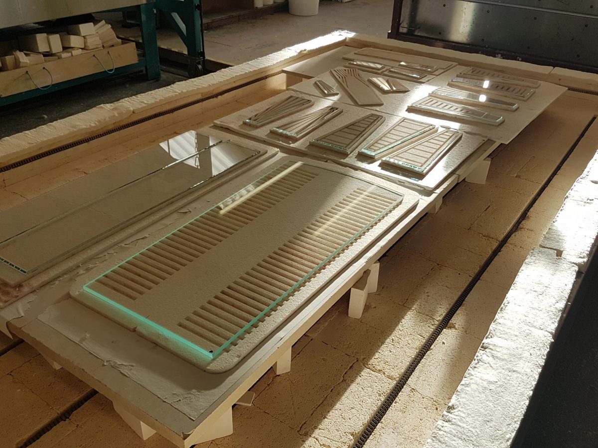 Slumping the glass in our kiln at Daedalian Glass Studios.