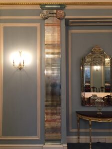 The-Belgravia-room-at-@TheLanesborough.-Ionic-glass-capitals-atop-of-unique-antique-silvered-reeded-brilliant-cut-mirror